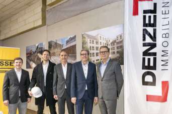 DENZEL feiert Dachgleiche für „Herz & Heim“ Foto